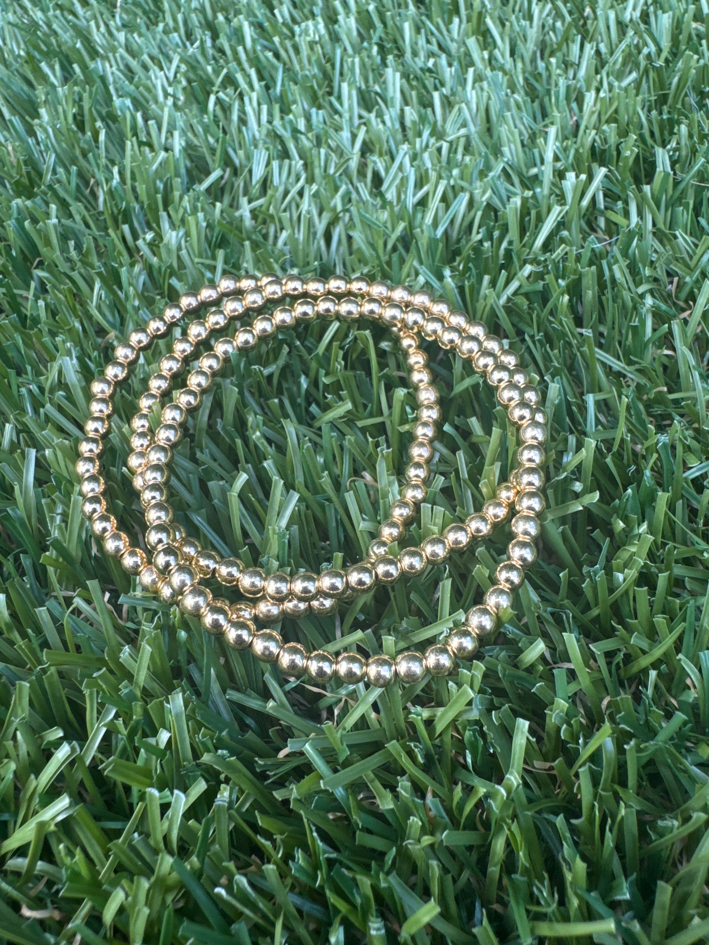 Tiny gold bead bracelet